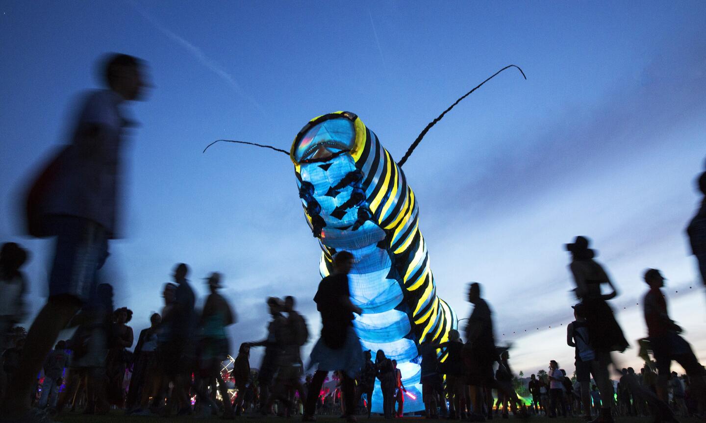 Poetic Kinetics' giant caterpillar moves between venues at the Coachella Valley Music and Arts Festival.