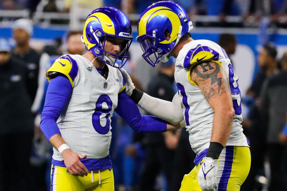 Rams kicker Brett Maher celebrates with linebacker Michael Hoecht after kicking a field goal against the Lions.