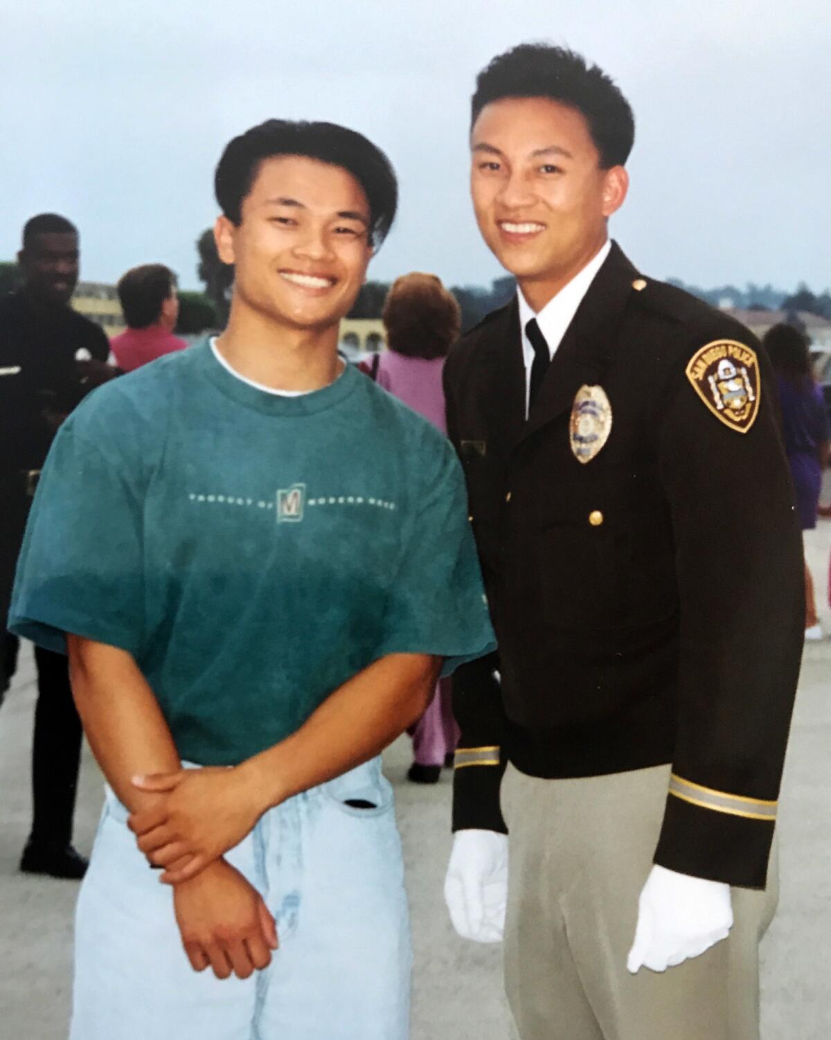 Timothy Vu, right, pictured with his brother, Tom, after graduating from the police academy in San Diego in 1993 at age 23. (Courtesy Timothy Vu)