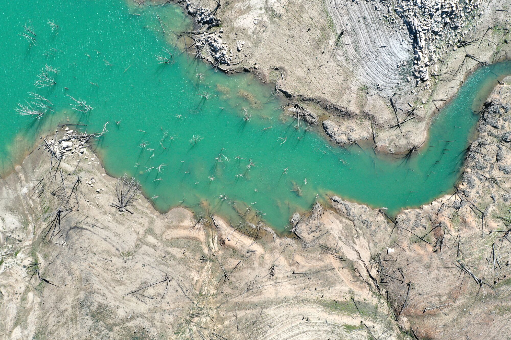 In an aerial view, low water levels are visible at Lake Oroville on April 27