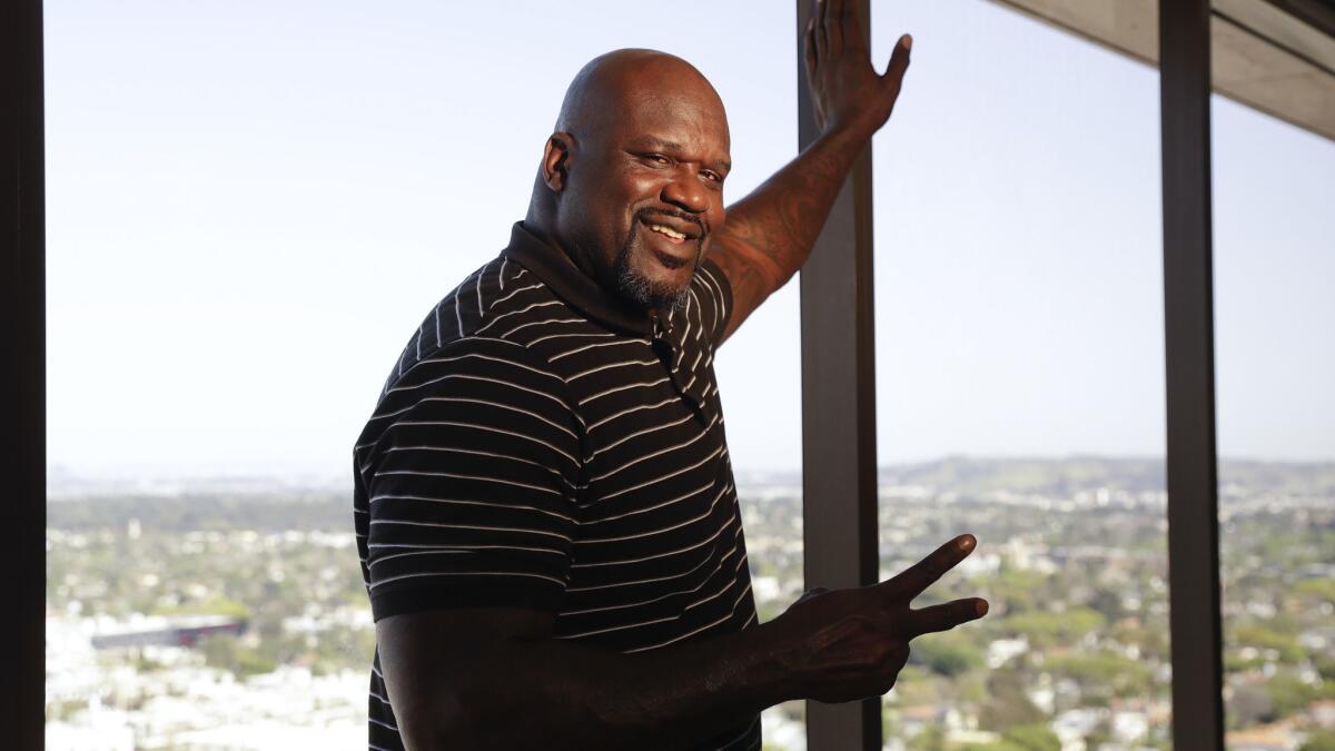 Shaquille O'Neal poses for a picture in Los Angeles.