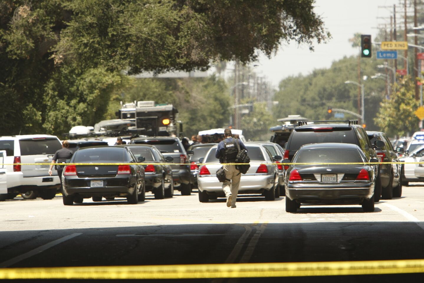 Police turned out in numbers in North Hollywood where a gunman is hiding in the neighborhood.