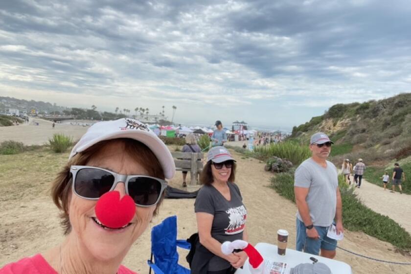 Members of The Red Nose Run team at the Sept. 10 Helen Woodward Surf Dog Surf-A-Thon event in Del Mar.
