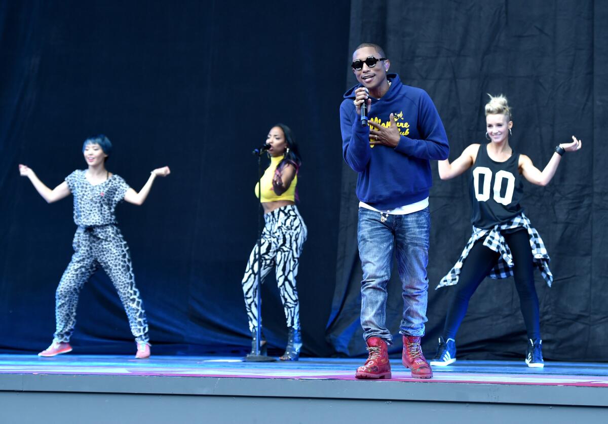 Pharrell Williams rehearses during the sound check before his show at the Hollywood Bowl.