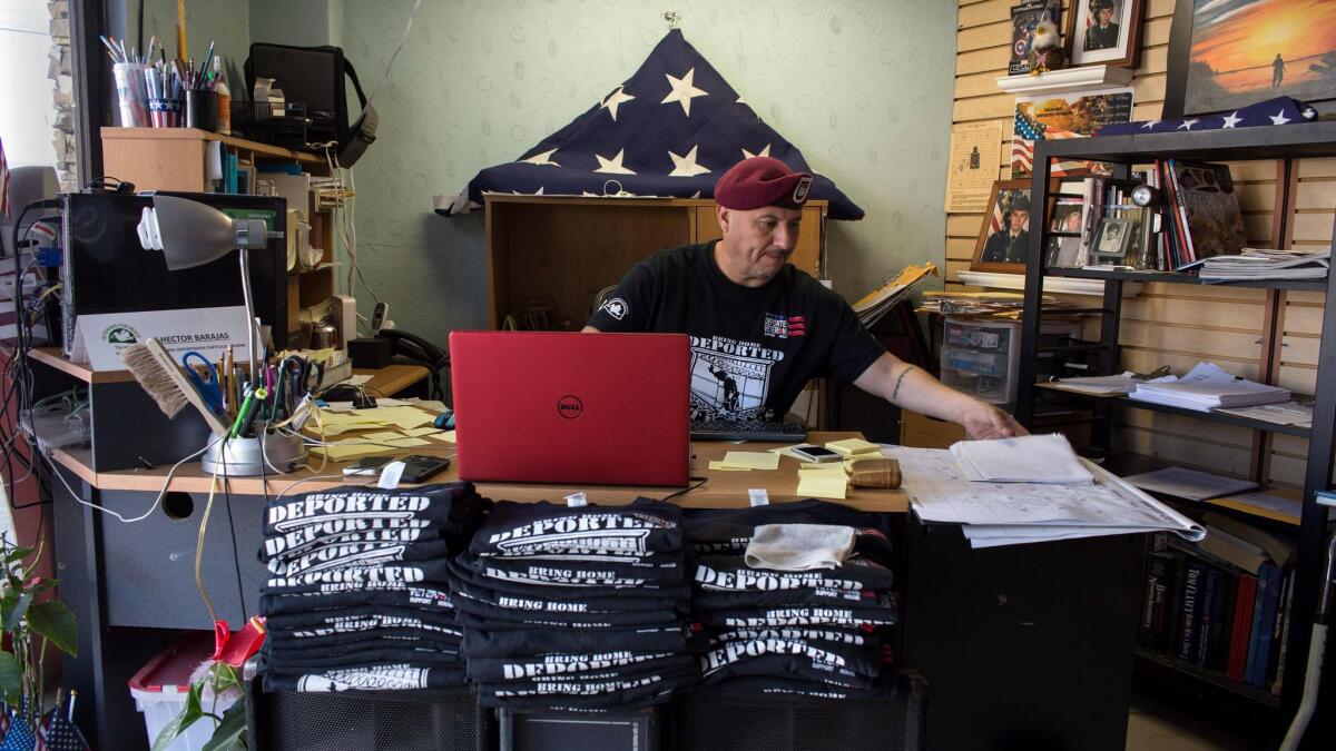 Hector Barajas-Varela, a U.S. military veteran who was deported to Mexico, works at his desk at the Deported Veterans Support House in Tijuana.