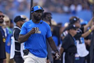 UCLA coach DeShaun Foster stands on the sideline during a loss to Indiana at the Rose Bowl on Sept. 14.