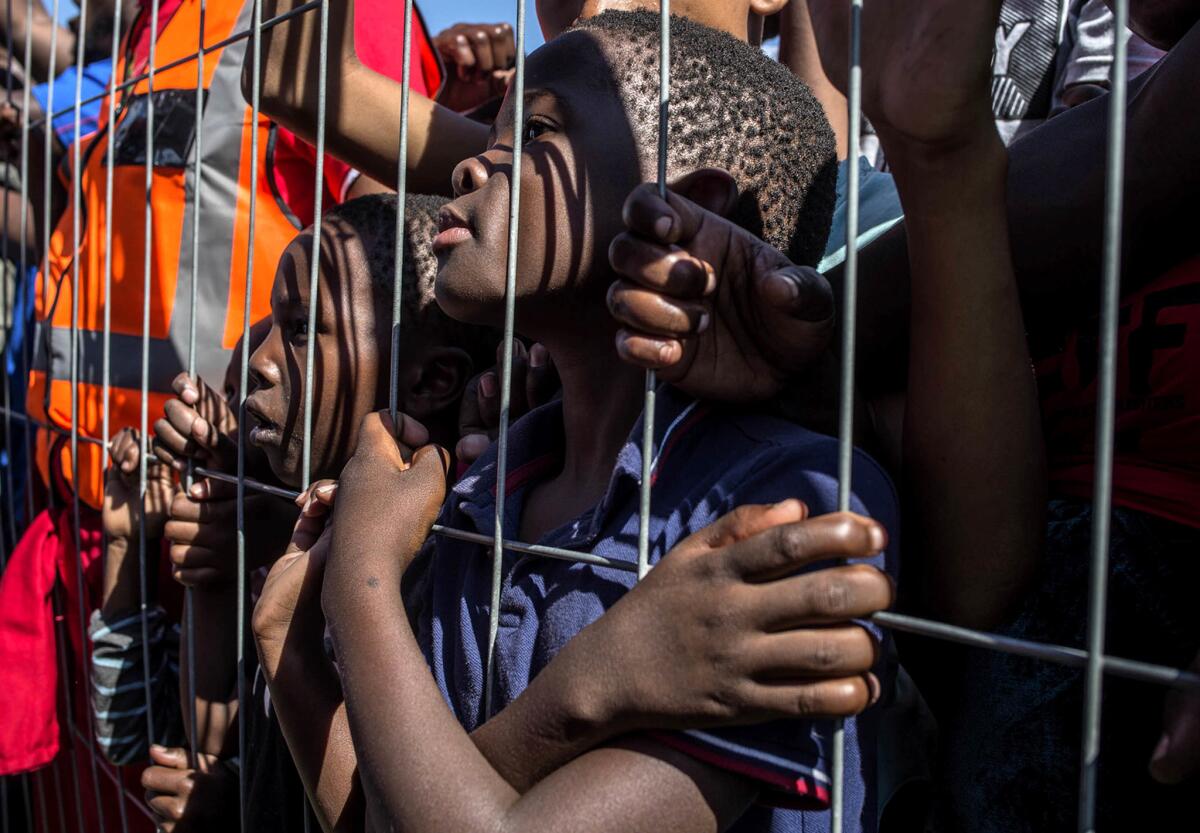 Children attend an Economic Freedom Fighters (EFF) party May Day rally in Johannesburg, South Africa. (Mujahid Safodien / Associated Press)