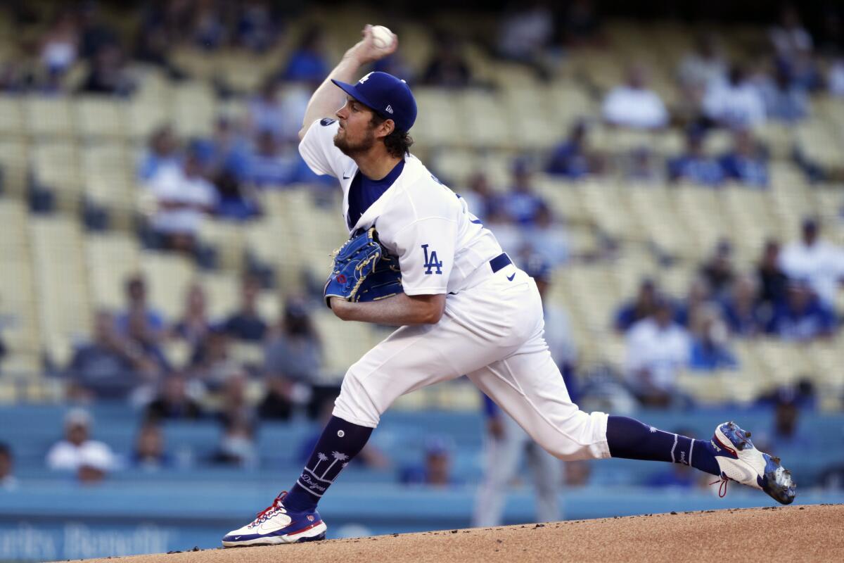 Los Angeles Dodgers starting pitcher Trevor Bauer throws to a Texas Rangers batter