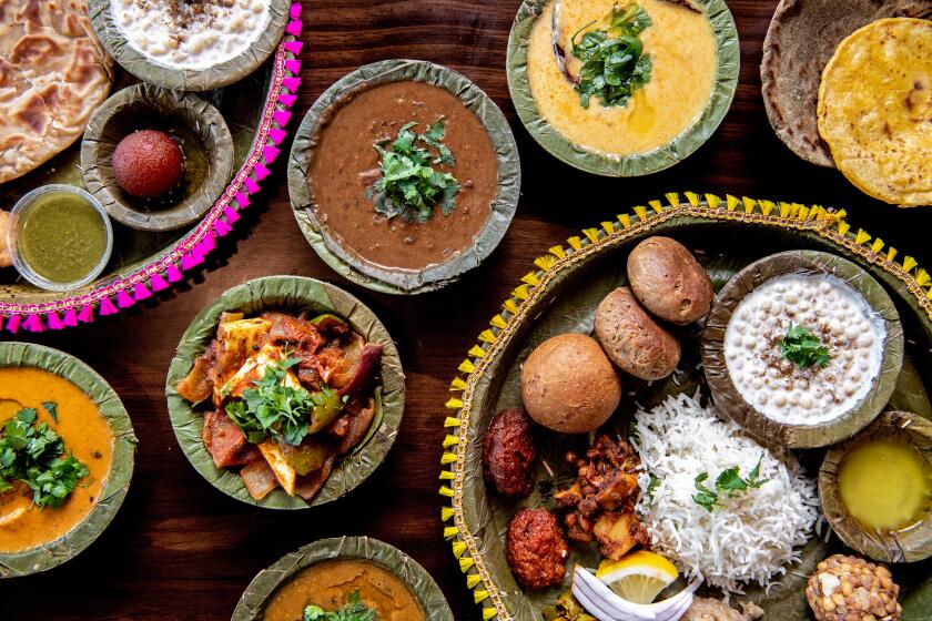 ARTESIA, CA - JUNE 29: A spread of the Shartaj and Maharaja Thali platters from Bhookhe restaurant on Thursday, June 29, 2023 in Artesia, CA. (Mariah Tauger / Los Angeles Times)
