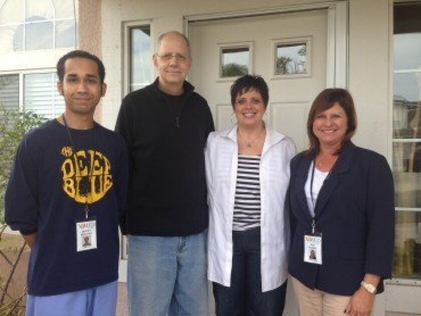 With the support of the XiMED Foundation, XiMED At Home provides free non-medical support services to oncology patients. Pictured: Caregiver Jeff Mitchell, John Wyckoff, Ramona Ferreira and XiMED At Home Operations Sue Harris. Photo/Kristina Houck
