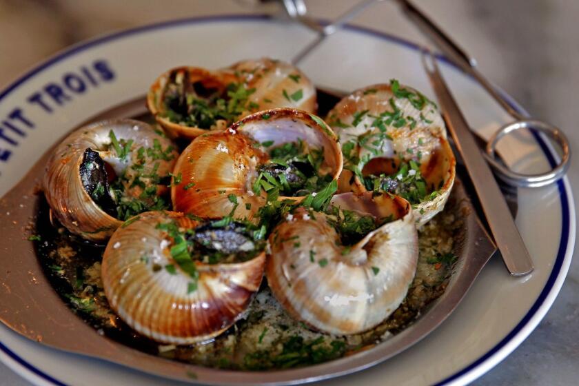 Ludo Lefebvre, Vinny Dotolo and Jon Shook's hot spot Petit Trois is nominated for best new restaurant by the James Beard Foundation. Above, the famed escargot at Petit Trois.