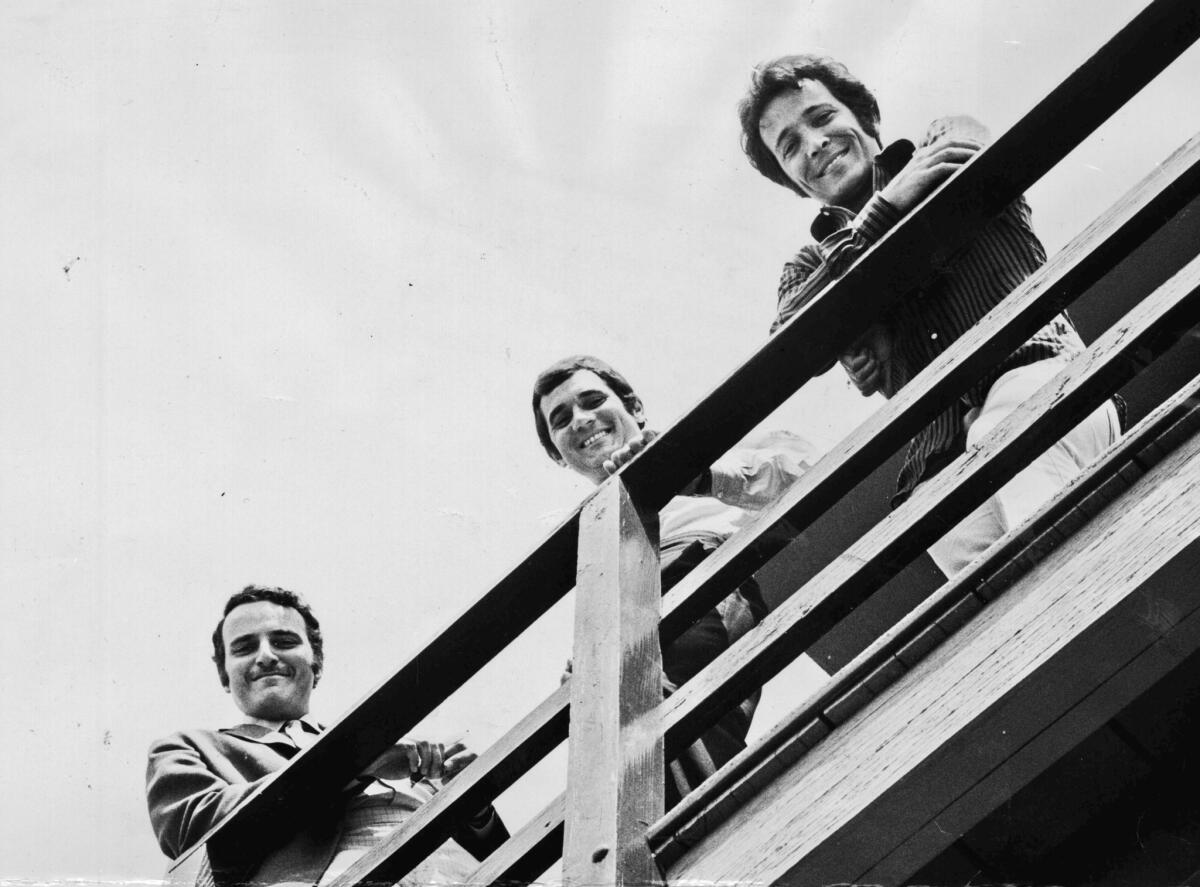 Gil Friesen, center, is flanked by Jerry Moss, left, and Herb Alpert. Friesen, sometimes called the ampersand in A&M, contributed significantly to the label's reputation for fair play among the musicians it signed.