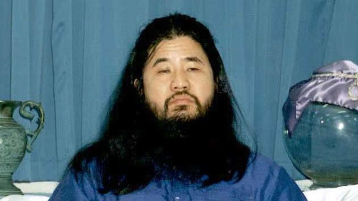 File photo from 1990 shows Shoko Asahara, guru of the doomsday Aum Shinrikyo cult, which carried out a deadly sarin attack on Tokyo's subway in 1995. He was executed Friday.