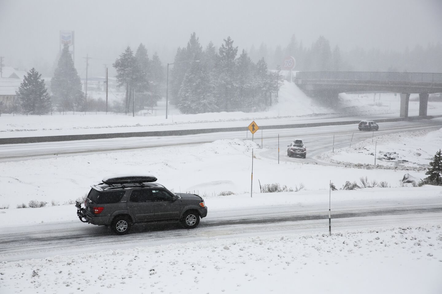 Snow falls along Interstate 80 at Exit 184 in Truckee.