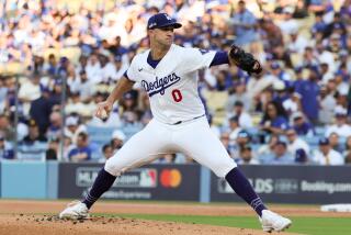 LOS ANGELES, CALIFORNIA - OCTOBER 06:  Jack Flaherty #0 oof the Los Angeles Dodgers delivers.