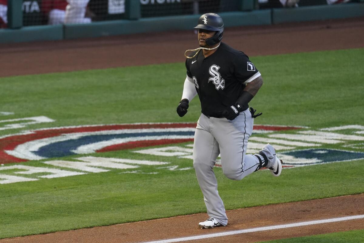 Chicago White Sox's Yermin Mercedes (73) runs the bases after hitting a home run during the second inning of a baseball game against the Los Angeles Angels Saturday, April 3, 2021, in Anaheim, Calif. (AP Photo/Ashley Landis)
