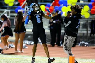 Carson's Nathan Williams celebrates semifinal win over Garfield.