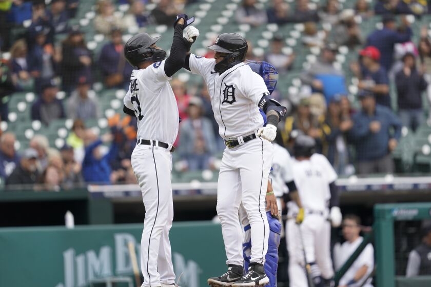 Detroit Tigers' Javier Baez, right, celebrates his two-run home run with Riley Greene (31) in the fifth inning of a baseball game against the Kansas City Royals in Detroit, Thursday, Sept. 29, 2022. (AP Photo/Paul Sancya)
