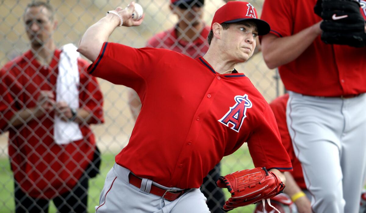 Angels starting pitcher Garrett Richards throws during a spring training workout on Feb. 20 in Tempe, Ariz.