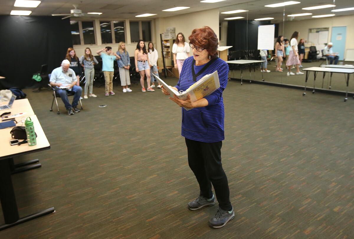 Director Donna Inglima reads lines during a group rehearsal for "I Never Saw Another Butterfly."