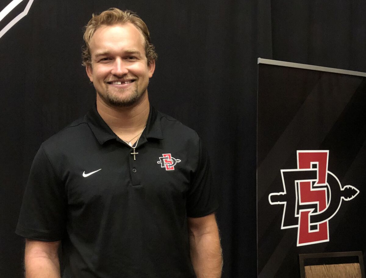 San Diego State linebacker Caden McDonald flashes his toothless smile Thursday during Mountain West football media days.