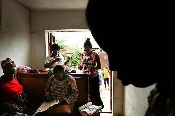 Women scarred by Sierra Leone's civil war take sewing classes at the center set up by Justice Renate Winter, president of the special court trying war crimes cases. The women have been left scarred by their abuse and are ostracized by their families.