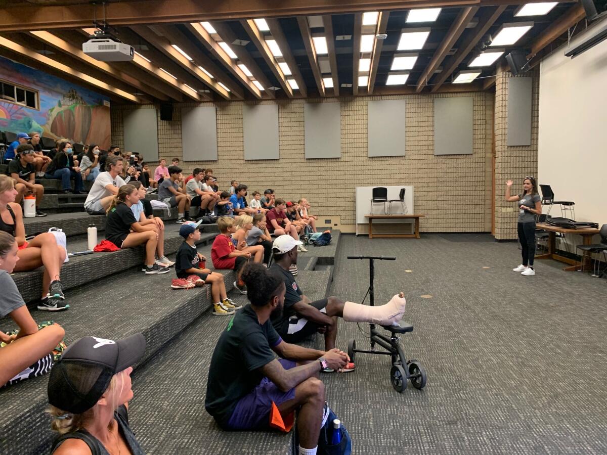 Tara Butcher speaking to students at Torrey Pines High School July 12.