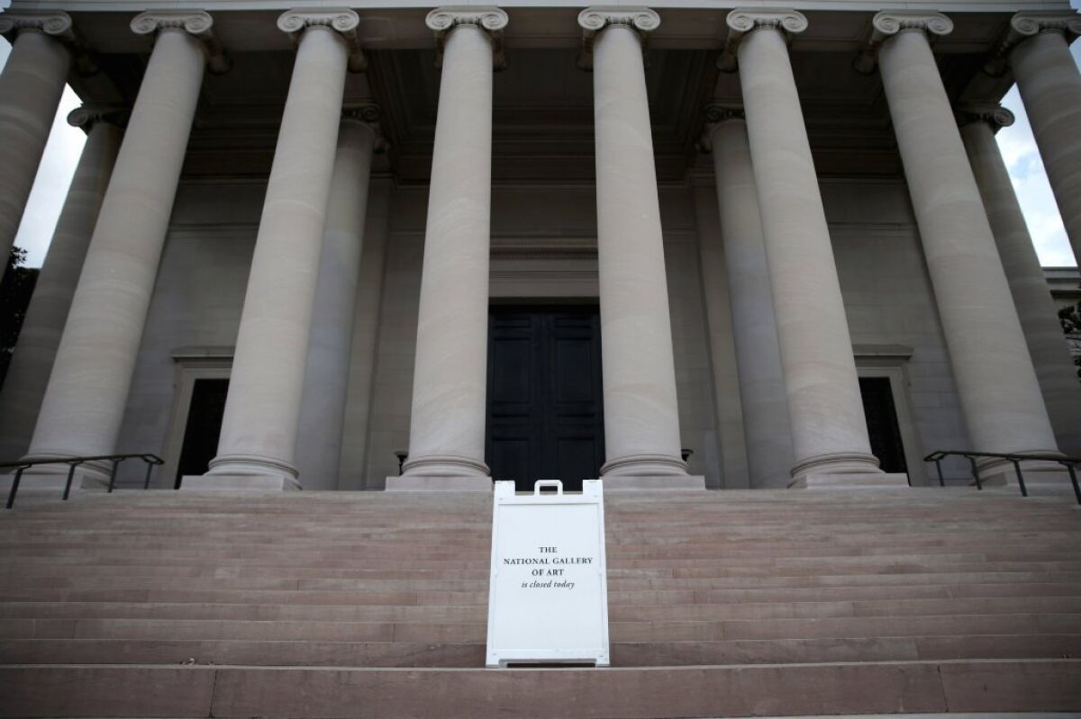 A sign alerting visitors that the National Gallery of Art in Washington is closed on Tuesday morning.
