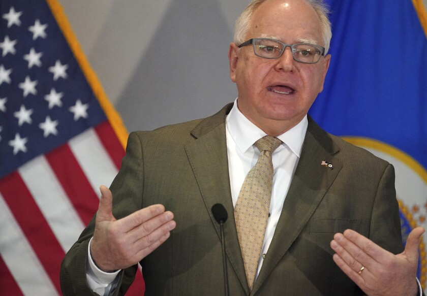 Minnesota Gov. Tim Walz answers a question from a reporter during a news conference to debut his state budget plan for the next two years Tuesday, Jan. 26, 2021 at the Department of Revenue building in St. Paul, Minn. (Anthony Souffle/Star Tribune via AP)