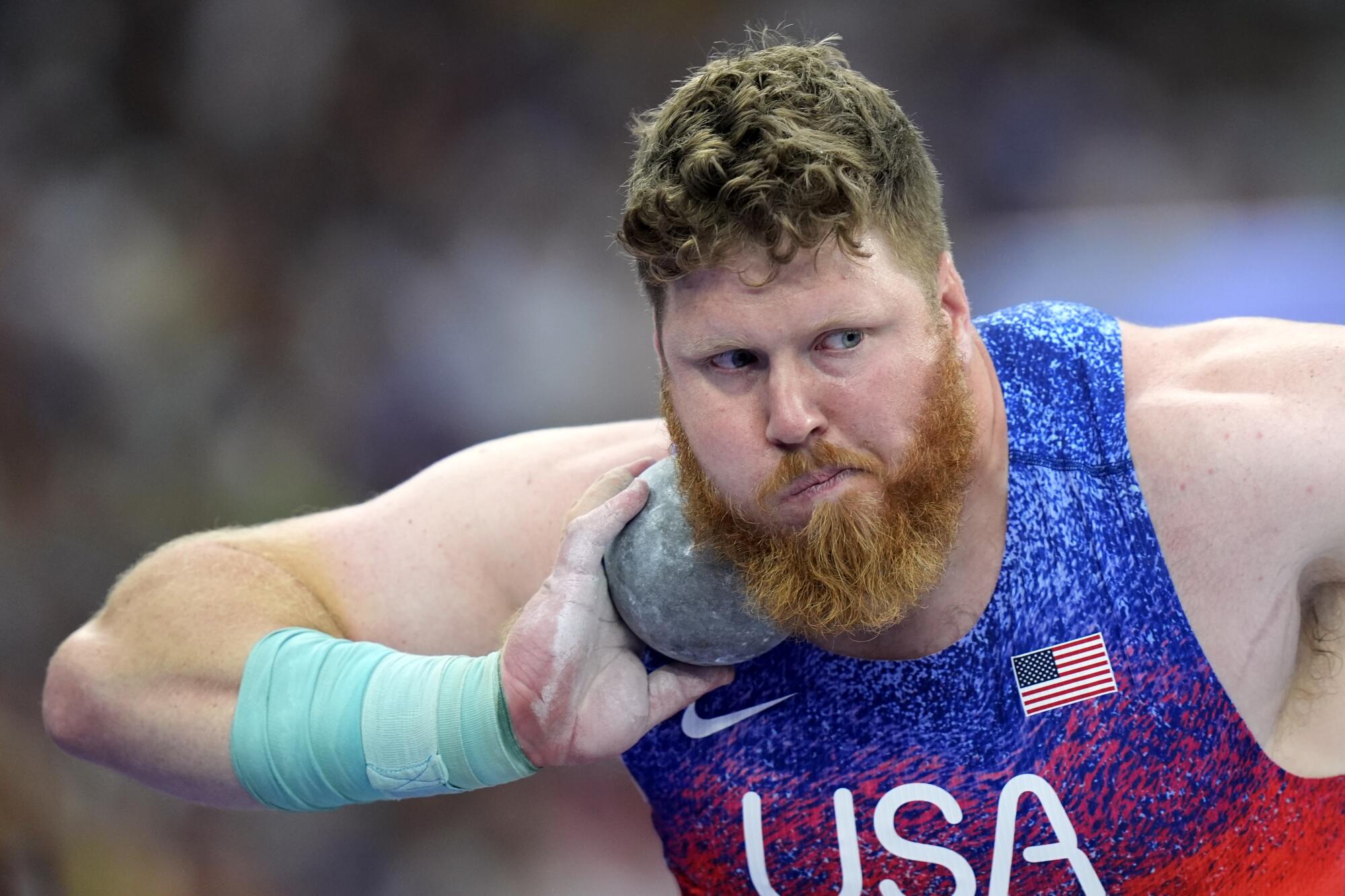 American Ryan Crouser competes in the men's shot put final at the Paris Olympics on Saturday.