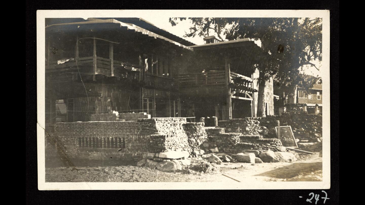 Archival photo of the Gamble House under construction at 4 Westmoreland Place, Pasadena, looking southeast. The photo was taken by Clarence Gamble in 1908. The photo is in the book "The Gamble House: Building Paradise in California."