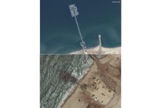 These images released by Maxar Technologies show the newly completed pier in the Gaza Strip on May 18, 2024, top, and the remaining section of the temporary pier on May 29, 2024. A string of security, logistical and weather problems have battered the plan to deliver desperately needed humanitarian aid to Gaza through a U.S. military-built pier. Broken apart by strong winds and heavy seas just over a week after it became operational, the project faces criticism that it hasn’t lived up to its initial billing or its $320 million price tag. (Satellite images ?2024 Maxar Technologies via AP)