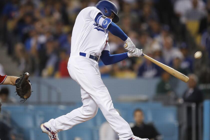 Los Angeles Dodgers' Cody Bellinger connects for a two-run home run during the eighth inning of a baseball game against the Washington Nationals, Saturday, April 21, 2018, in Los Angeles. (AP Photo/Jae C. Hong)