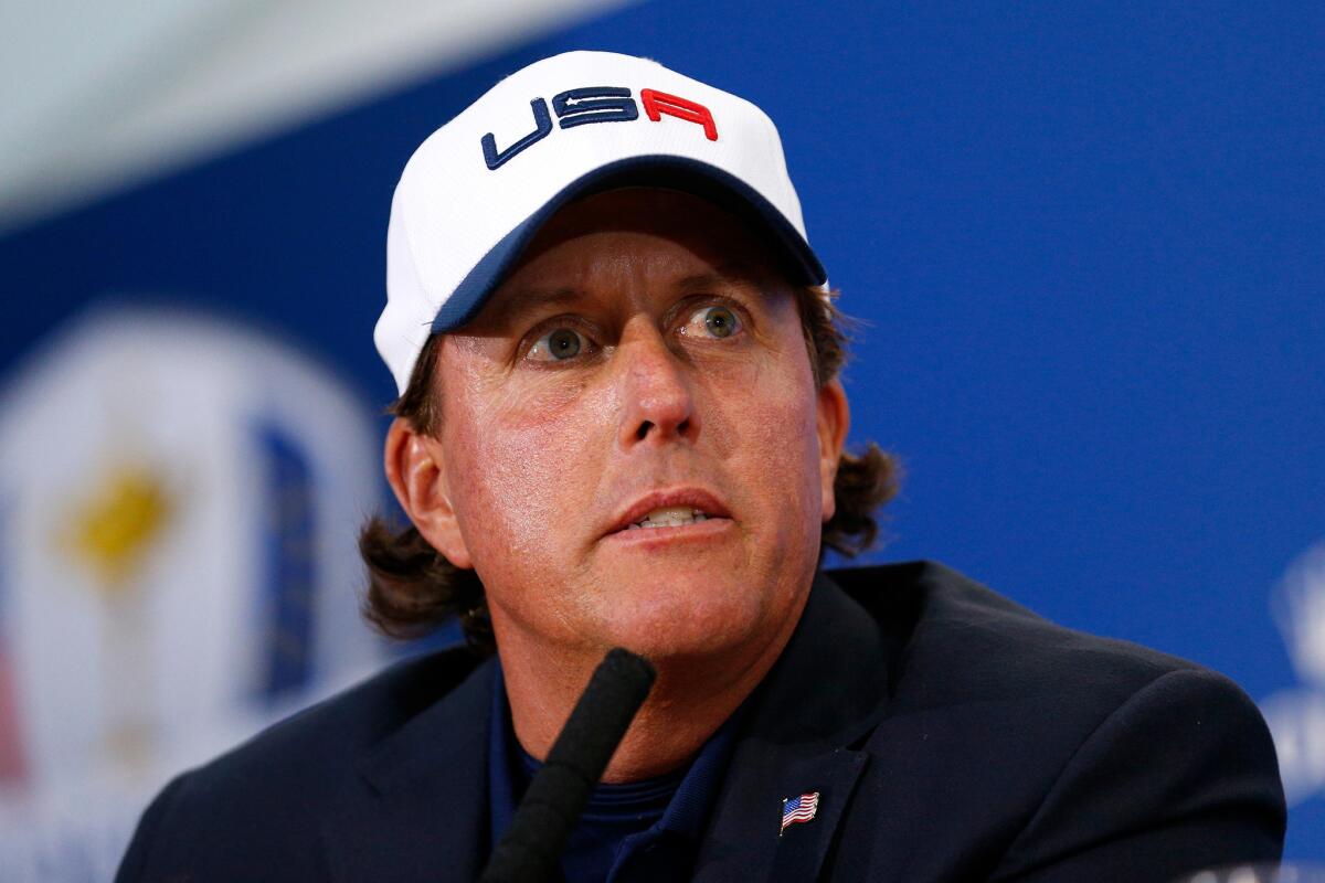 Phil Mickelson talks during a news conference after his team was defeated by Europe on Sunday.
