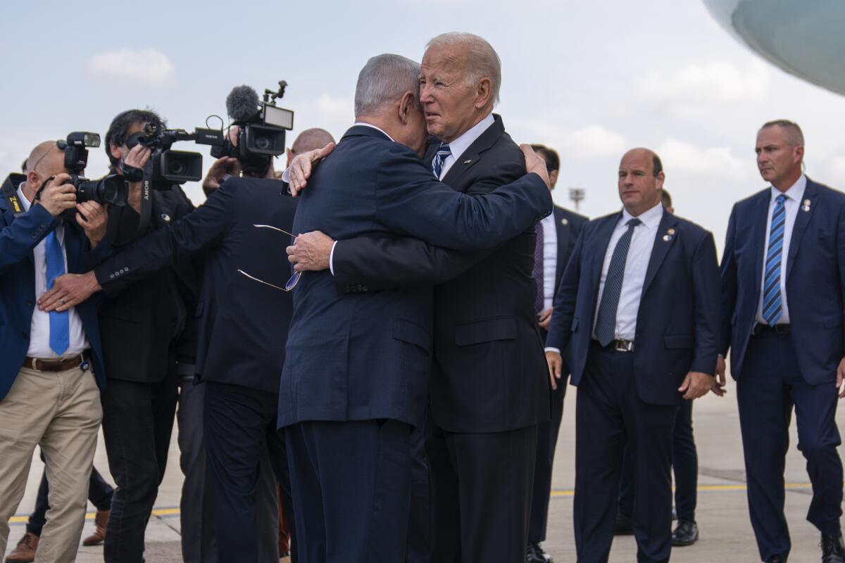 President Biden hugs Israeli Prime Minister Benjamin Netanyahu
