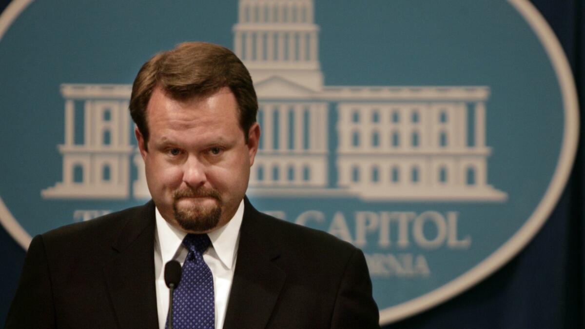 Rob Stutzman, Gov. Arnold Schwarzenegger's communications director, speaks to the press in Sacramento at the state Capitol in 2005