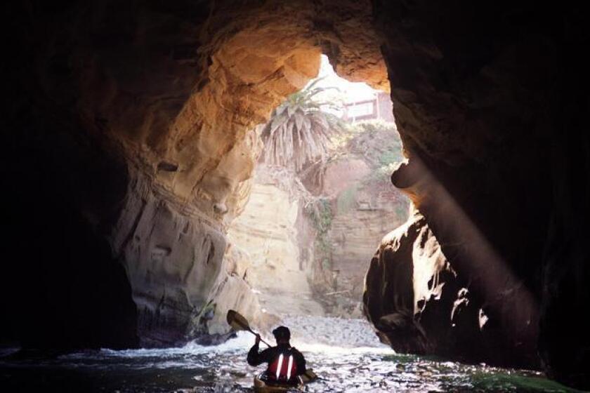 It's only a quarter-mile paddle, but kayaking in the La Jolla Caves is a worthwhile adventure trip. (U-T File Photo)