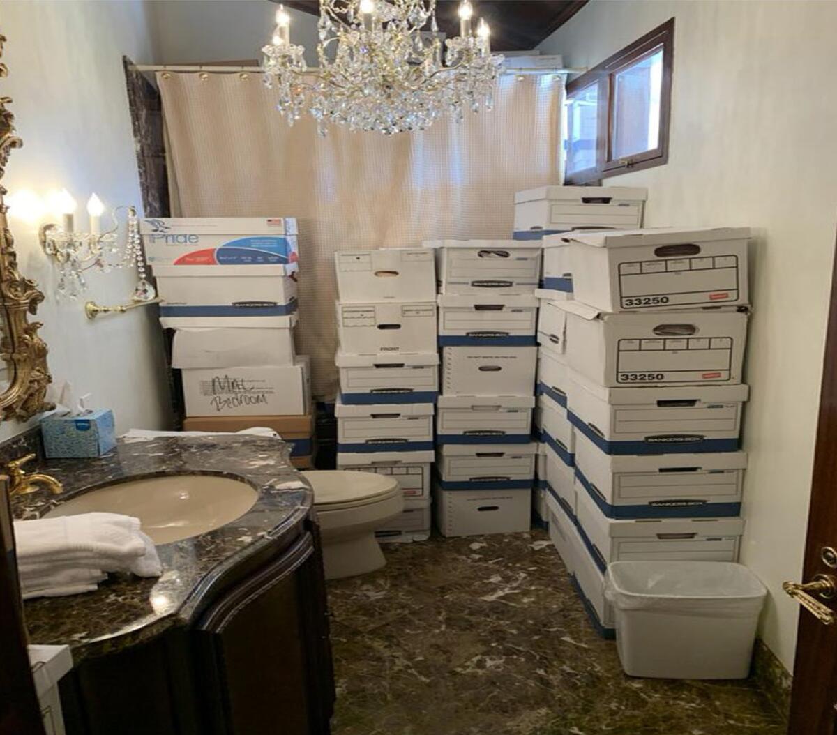 This image from the indictment against former President Trump shows boxes of records stored in a bathroom at Mar-a-Lago.