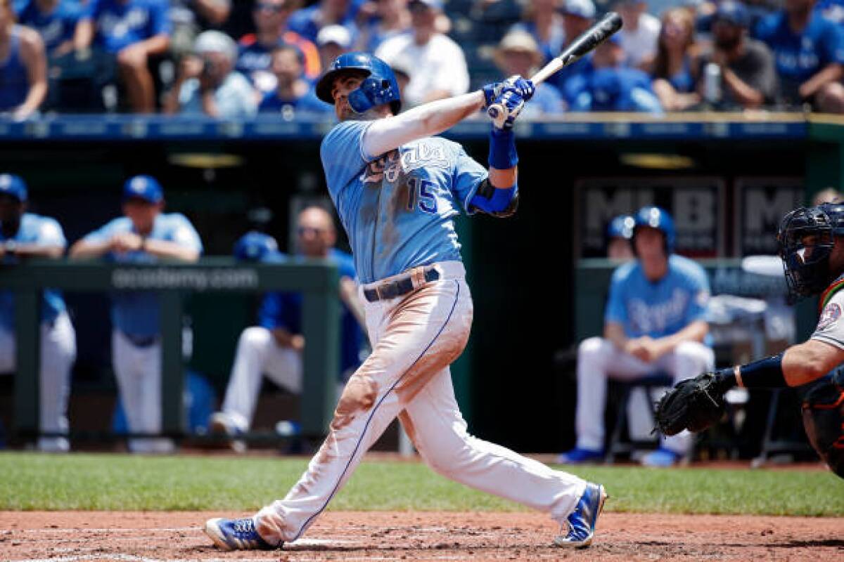 Kansas City Royals second baseman Whit Merrifield bats during a game against the Astros.