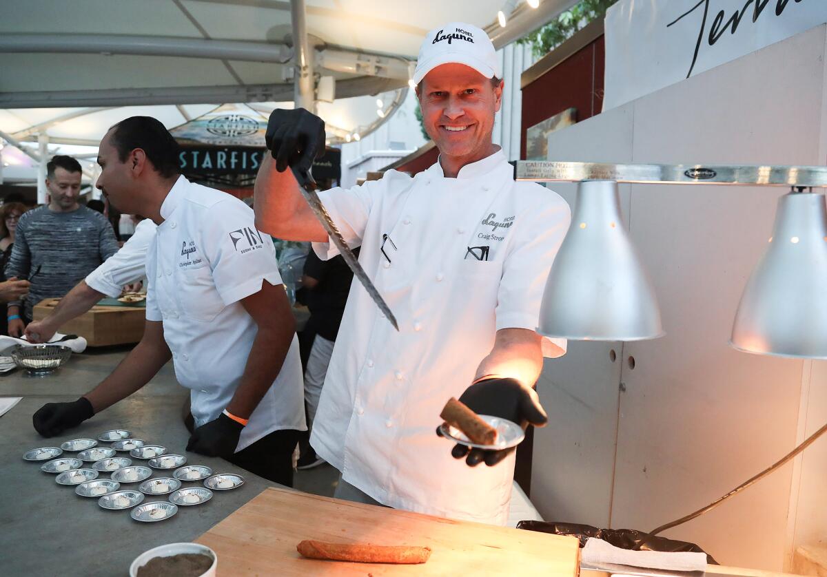 Craig Strong, chef from Hotel Laguna, cooks for guests during the Taste of Laguna Food and Music Festival.