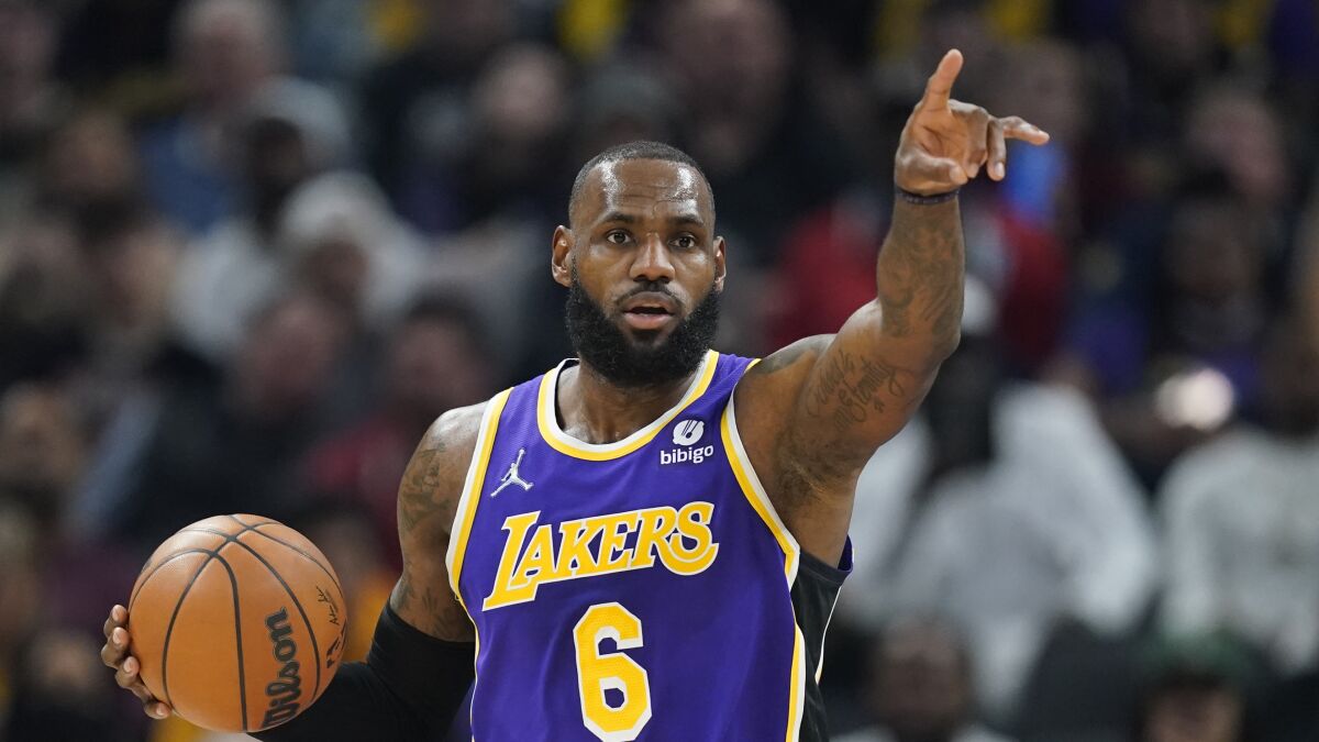 Los Angeles Lakers' LeBron James ribbles.