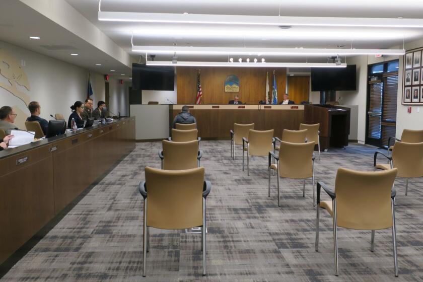 After sweeping countywide coronavirus closures were announced earlier that week, the La Ca?ada Flintridge City Council on Tuesday conducted business largely remotely, providing social distancing seating.