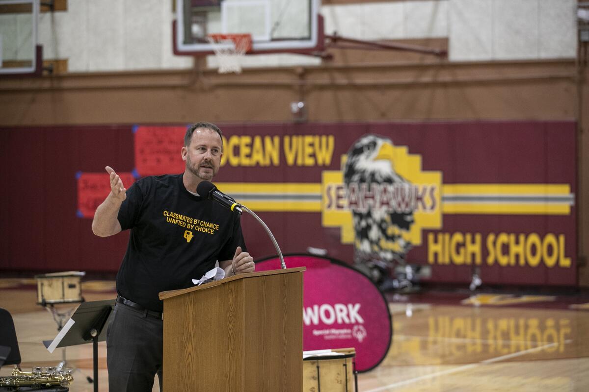 Rob Rasmussen, the principal of Ocean View High School, speaks during an assembly on Nov. 16.