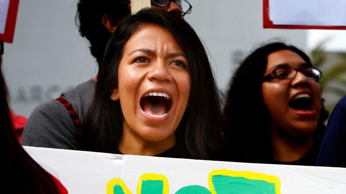 UCLA student Yesenia Capellino lends her voice during a rally for the Dream Act on the lawn of Marco Antonio Firebaugh High School in Lynwood on July 28, 2011.