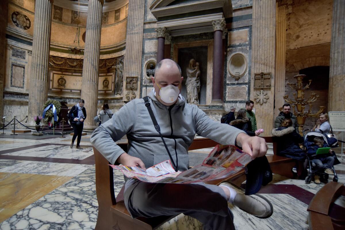 A masked tourist at Rome's Pantheon