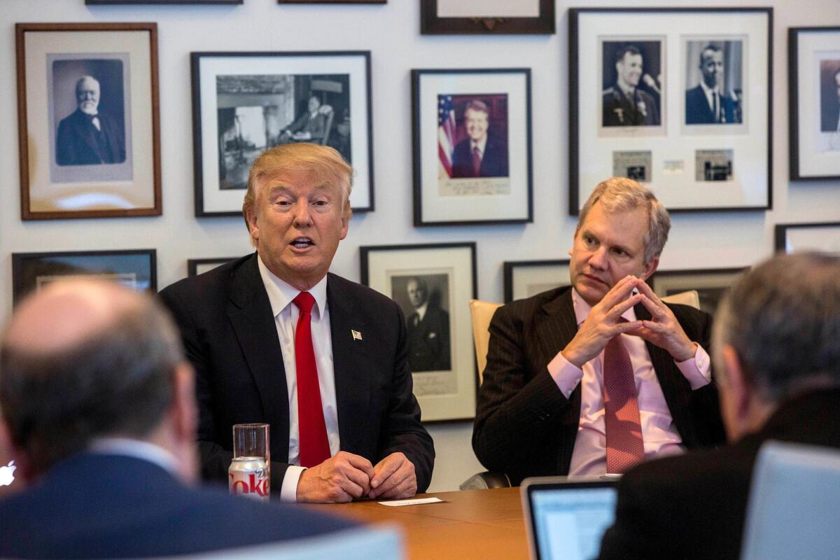 President-elect Donald Trump meets Tuesday with New York Times journalists and executives, including Publisher Arthur Sulzberger Jr., right.