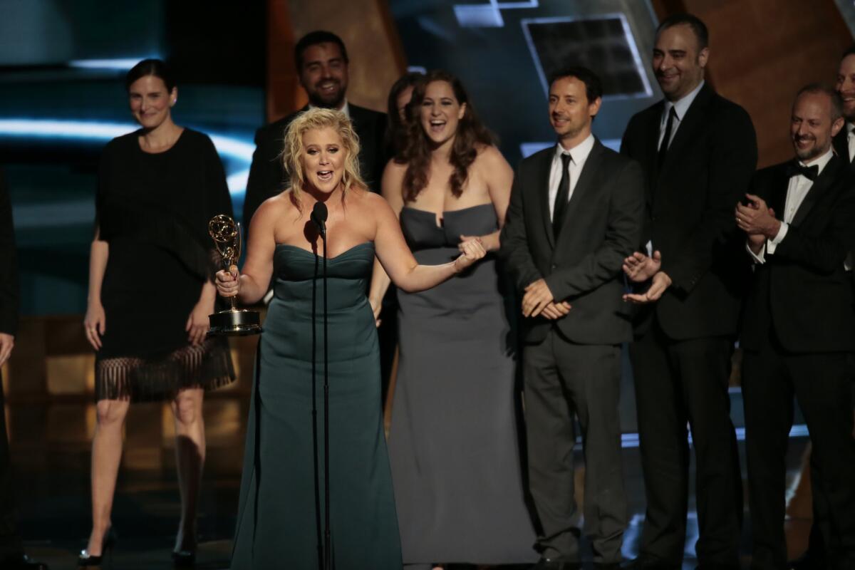 Amy Schumer on stage to accept the Emmy for Outstanding Variety Sketch Series.