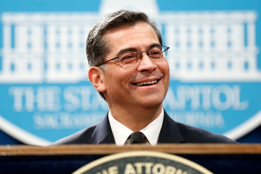 Democratic Caucus Chairman Xavier Becerra (D-Los Angeles) holds a press conference after being sworn in by Gov. Jerry Brown as the next attorney general of California at the State Capitol building in Sacramento on Jan. 24.