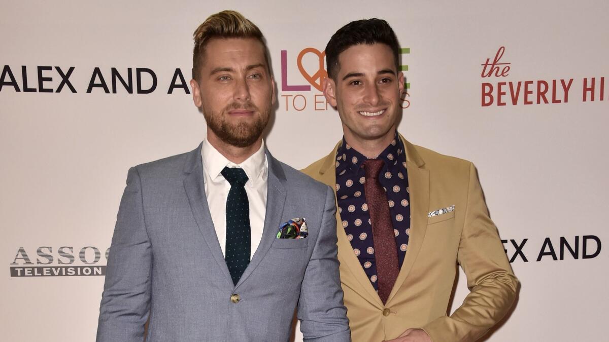 Lance Bass, left, and Michael Turchin. (Alberto E. Rodriguez / Getty Images)