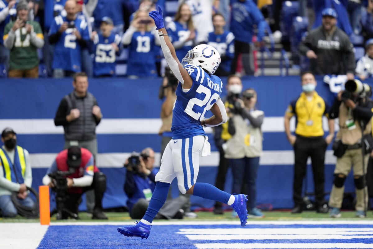 Indianapolis Colts running back Jonathan Taylor (28) runs in for a touchdown in the second half of an NFL football game against the Tennessee Titans in Indianapolis, Sunday, Oct. 31, 2021. (AP Photo/AJ Mast)